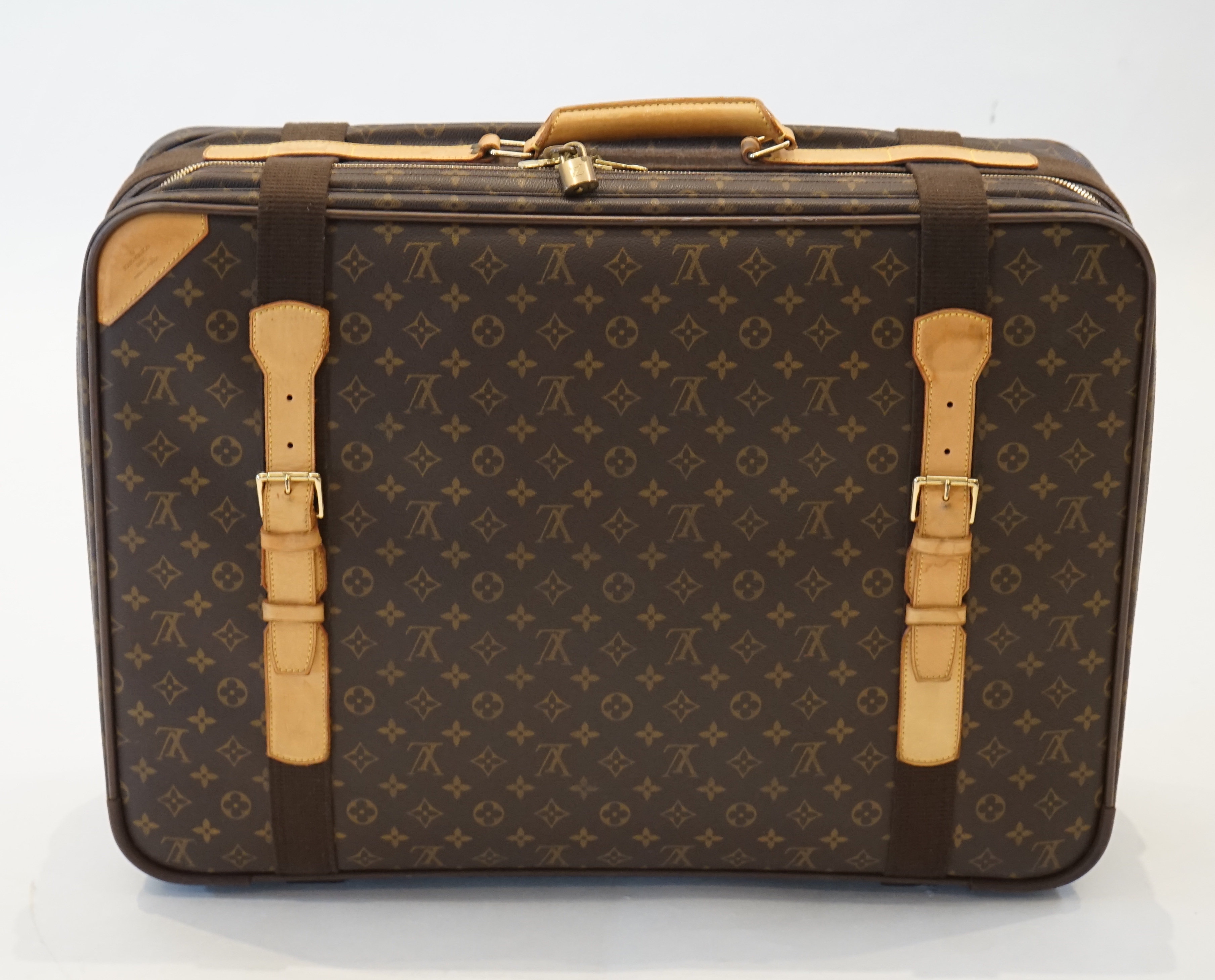 A Louis Vuitton Satellite 65 travel bag width 65cm, depth 19cm, height 46cm
